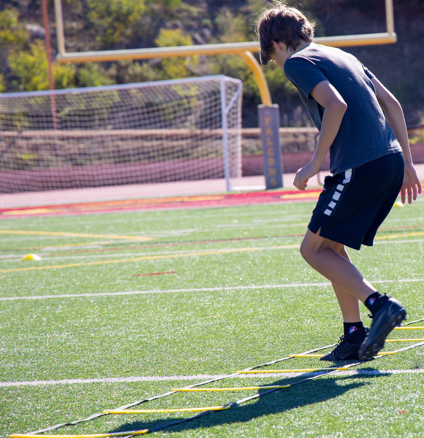Kid and Goal Post in BG